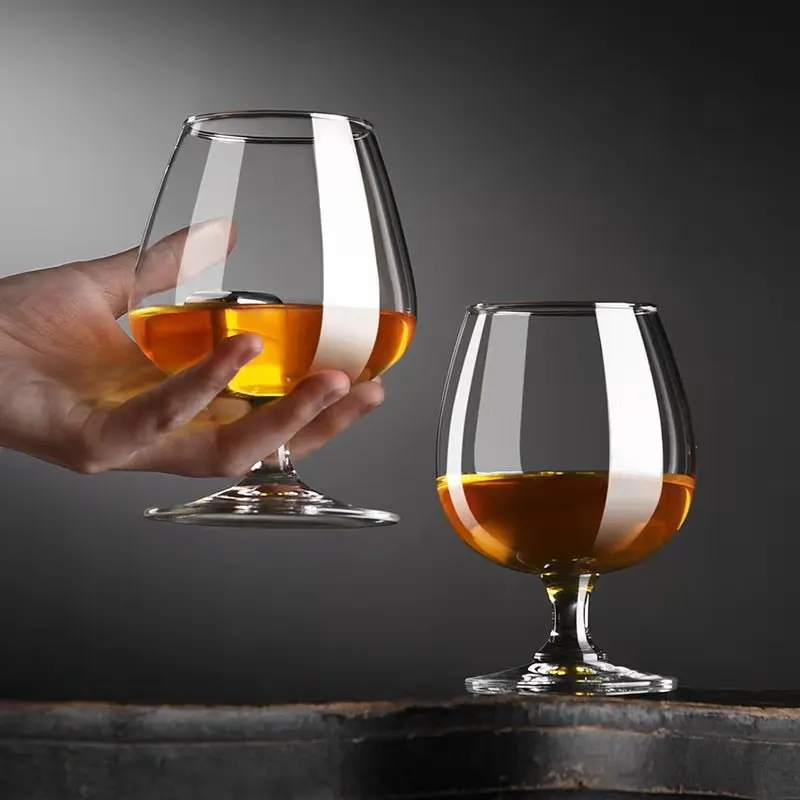 Hot vodka brandy frosted wine glass and brandy whisky glass goblet