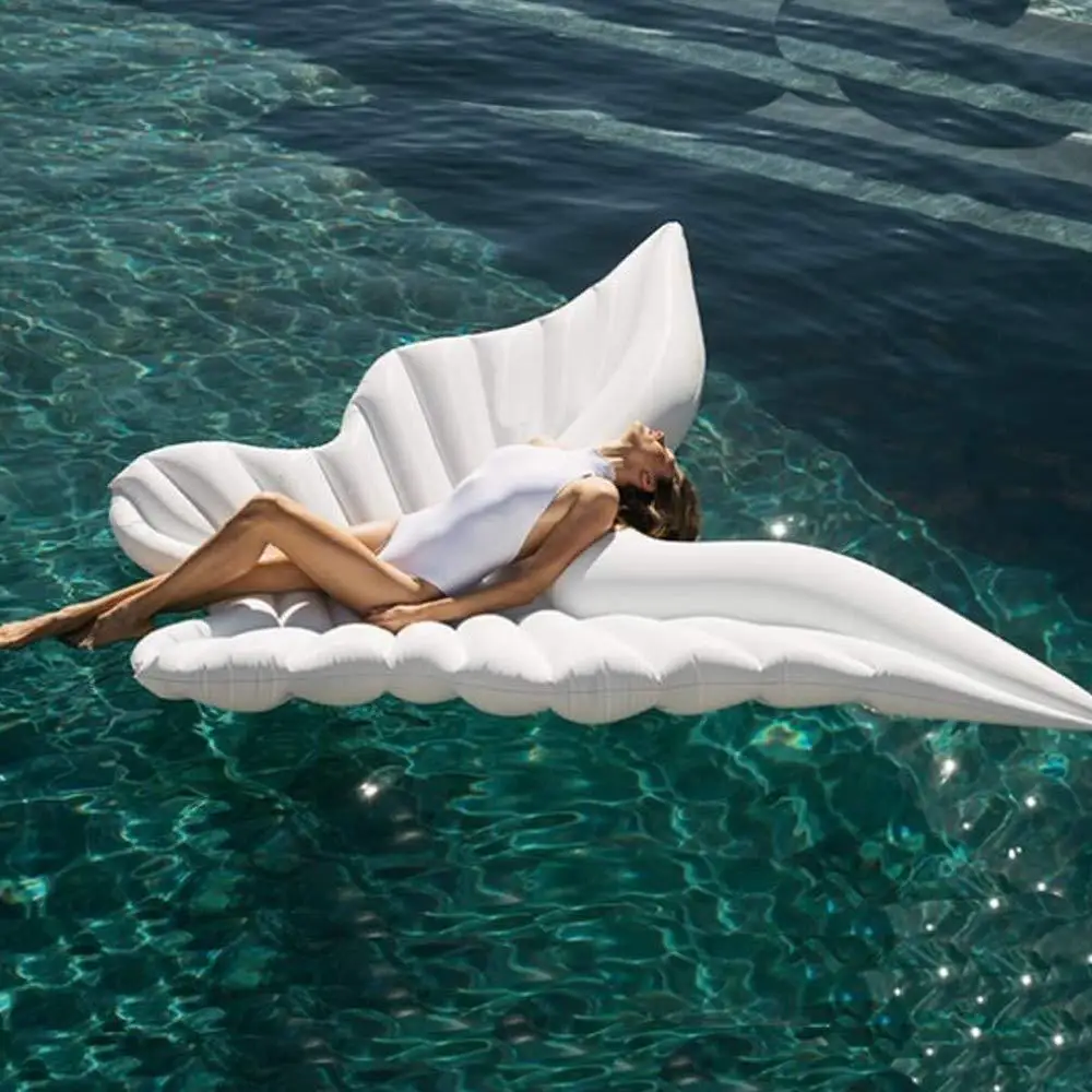 Inflatable butterfly wings floating on the floating bed angel wings playing in the water floating pad