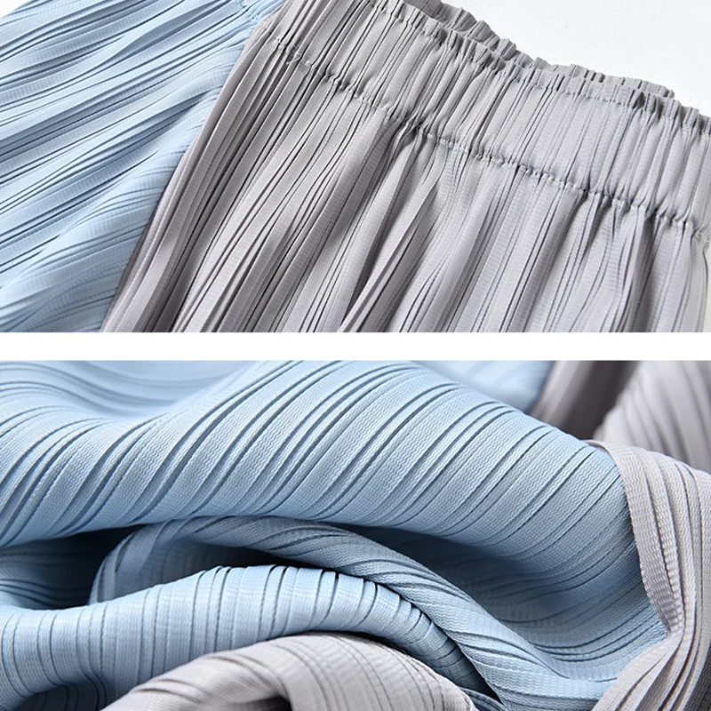 New polyester fabric two-color stitching slit irregular pleatedskirt