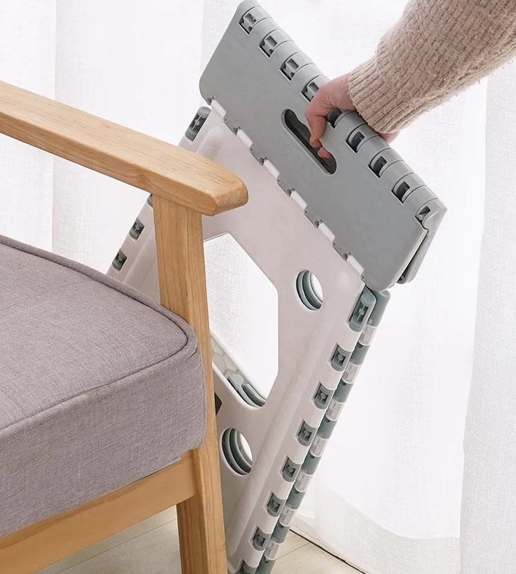 
Low cost durable plastic folding chair 