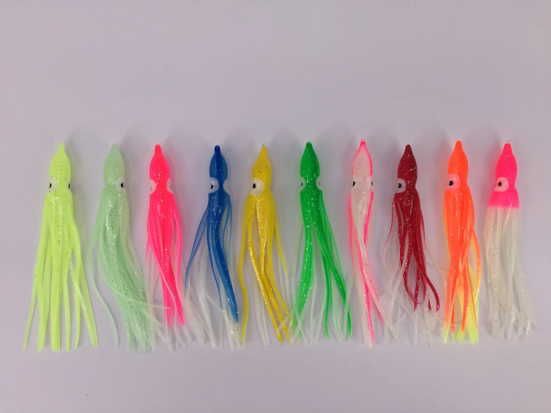 High Quality OEM Artificial Soft Plastic Octopus Fishing Lures Luminous  Trolling Fishing Pvc Squid Skirts Lure