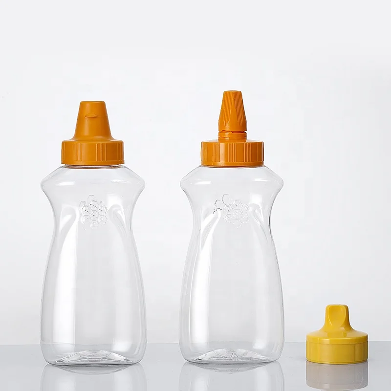 Factory wholesale 500g 800g 1000g PET empty honey container jars  honey packaging plastic bottle with tip cap