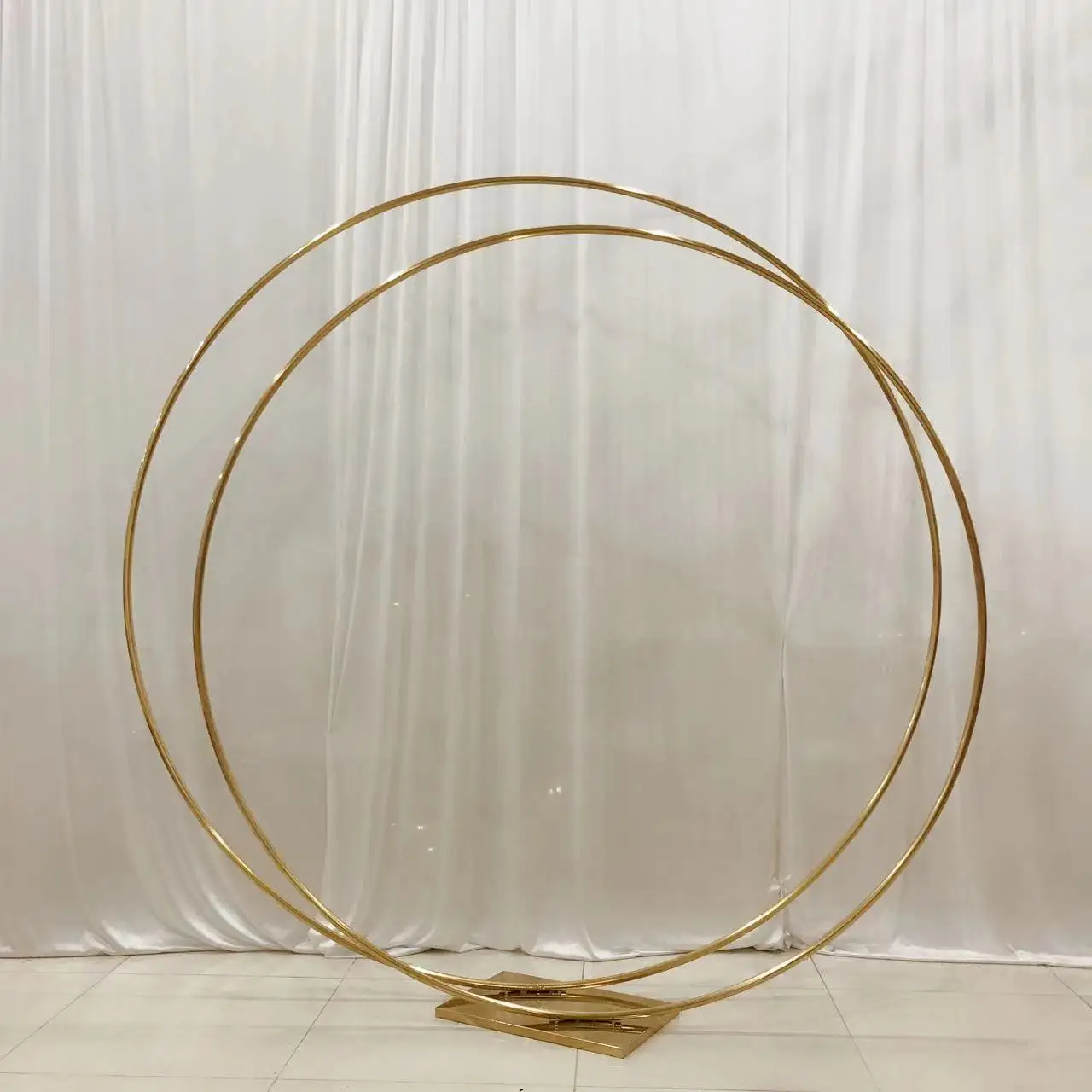 Double Ring Circle Golden Color Stainless Steel Wedding Backdrop Made by Occasions Furniture