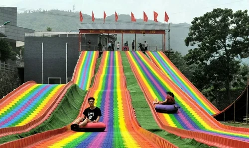 Outdoor rainbow dry snow slide for children and adult to have fun