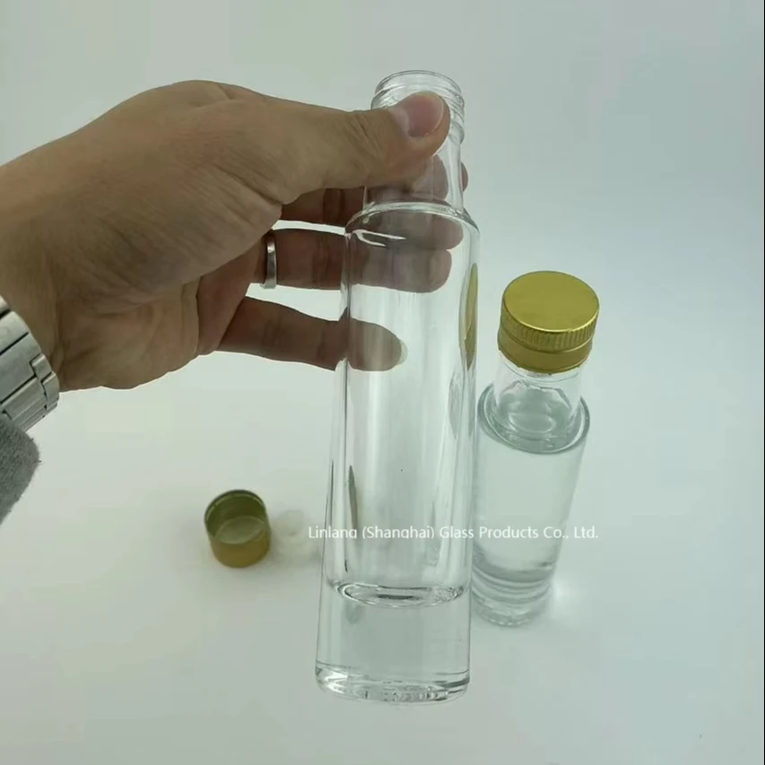Shanghai Linlang лидер продаж оптовая продажа прозрачная стеклянная бутылка для оливкового масла объемом 100 мл с крышкой защиты от заправки