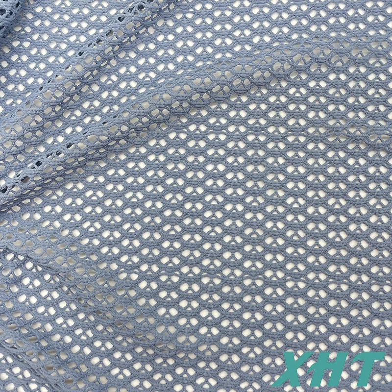 Hot selling color dyeable  hollowed-out eyelets fabric for  swimwear