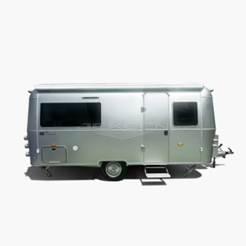 Jekeen Airstream Motorhome 2024 High Quality New Design Off Road Camping Caravan RV Camper Trailer With Inside Bed For Sale