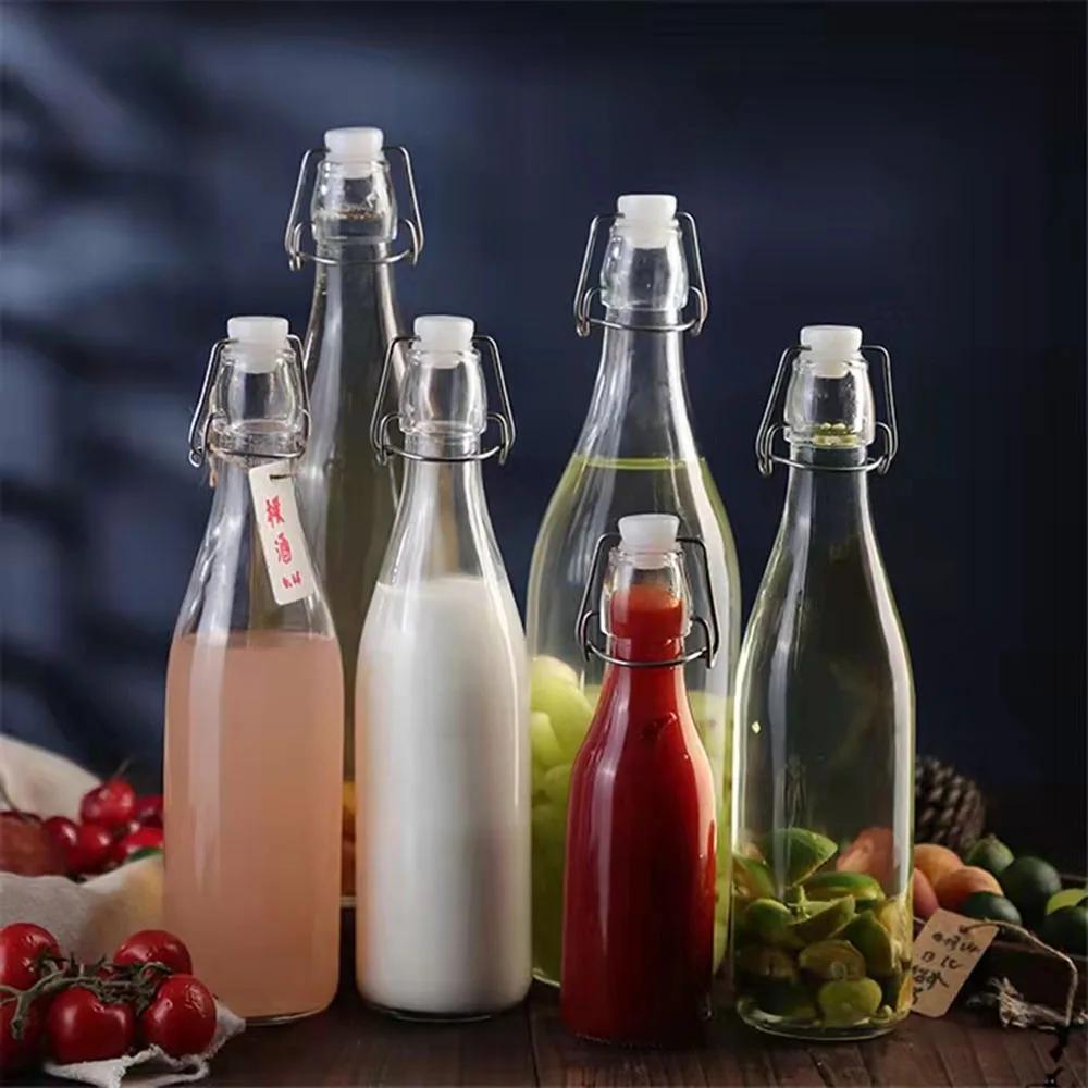Wholesale factory clear Sauce olive oil packing container 100ml 200ml 500ml 750ml top cover fruit juice beverage glass bottles