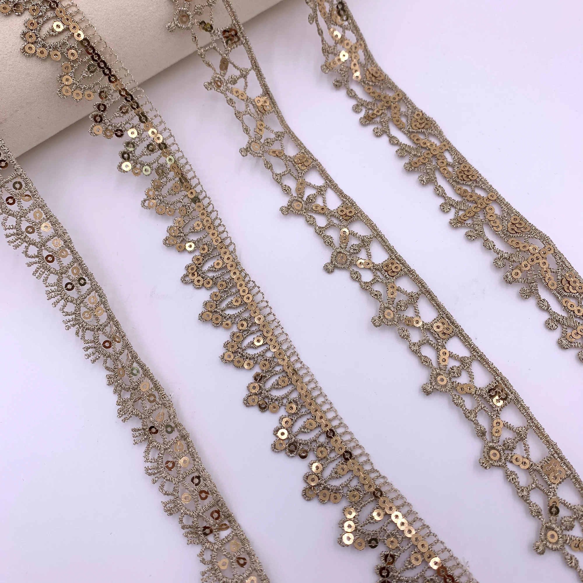 High Quality Wholesale Shiny Polyester Water Soluble Delicate Sequin Gpo Lace Trim Gold