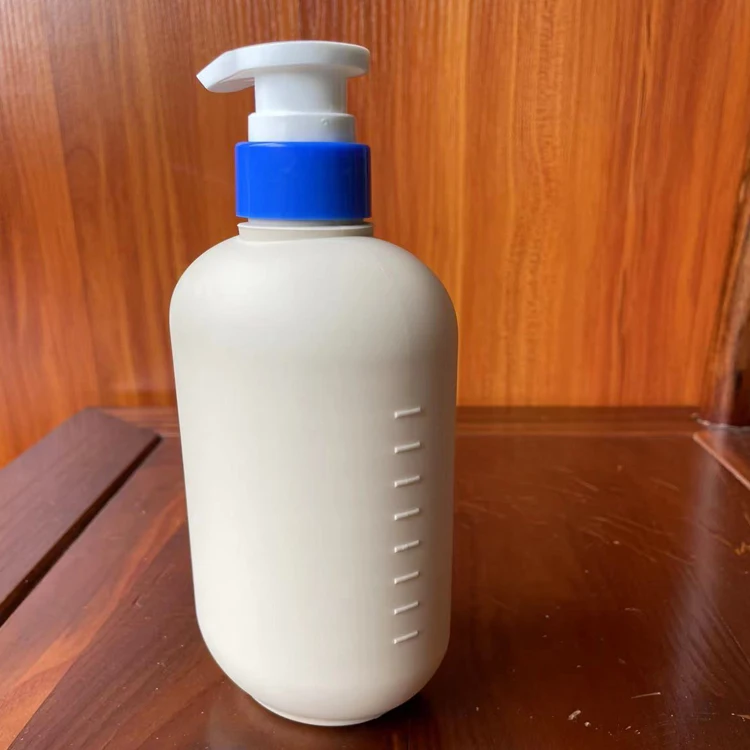 Wholesale custom 500ml plastic white HDPE round lotion bottle for shampoo body wash skin care packaging