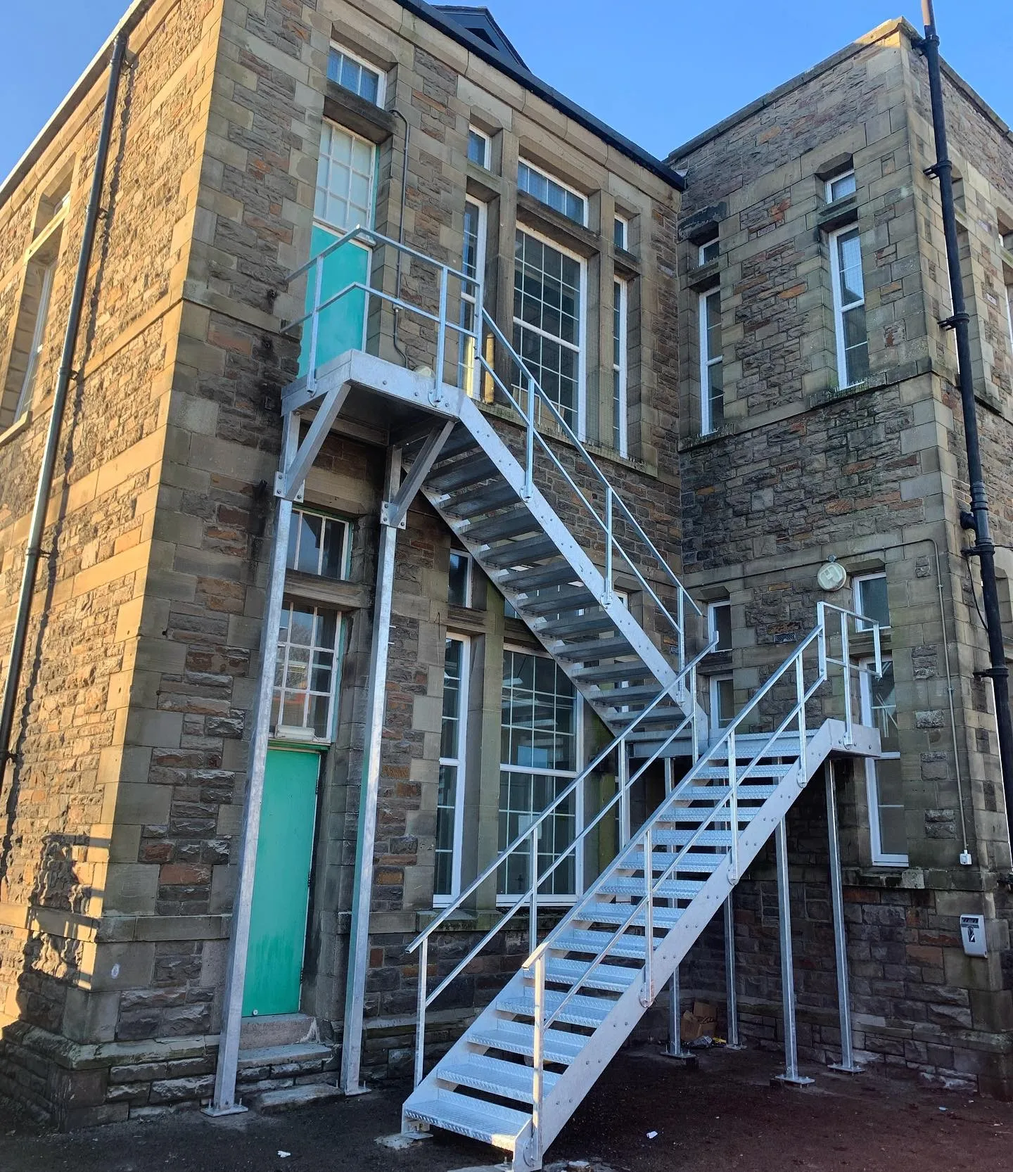 outdoor staircase with steel galvanised suspended grating