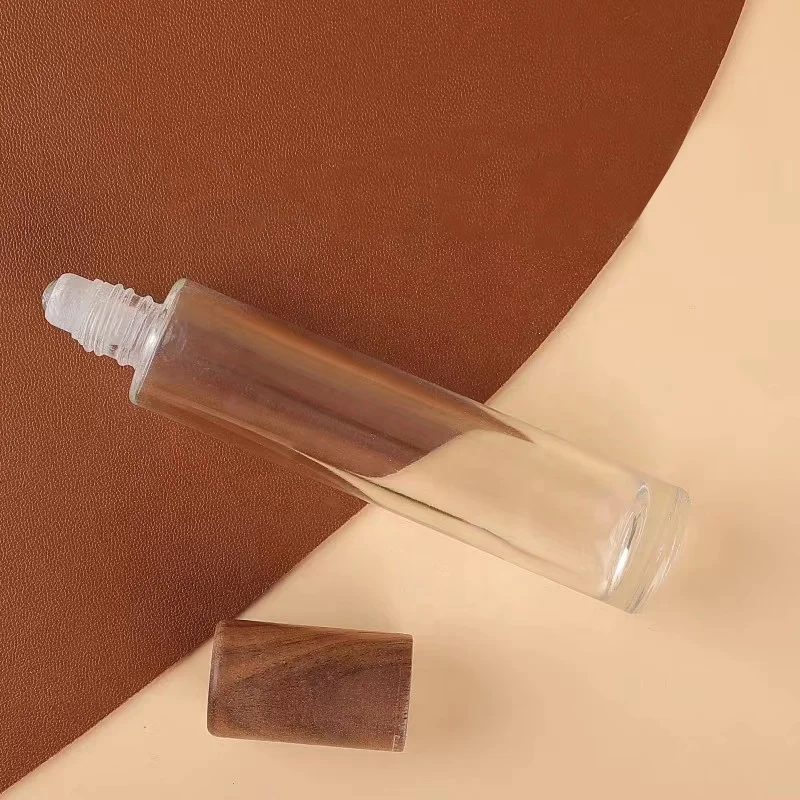 Clear glass essential oil roller bottles 10ml 15ml roller bottles for essential oils with wood cap