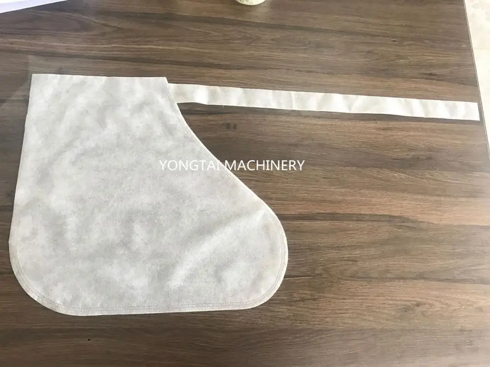 Медицинская автоматическая машина для производства одноразовых чехлов обуви