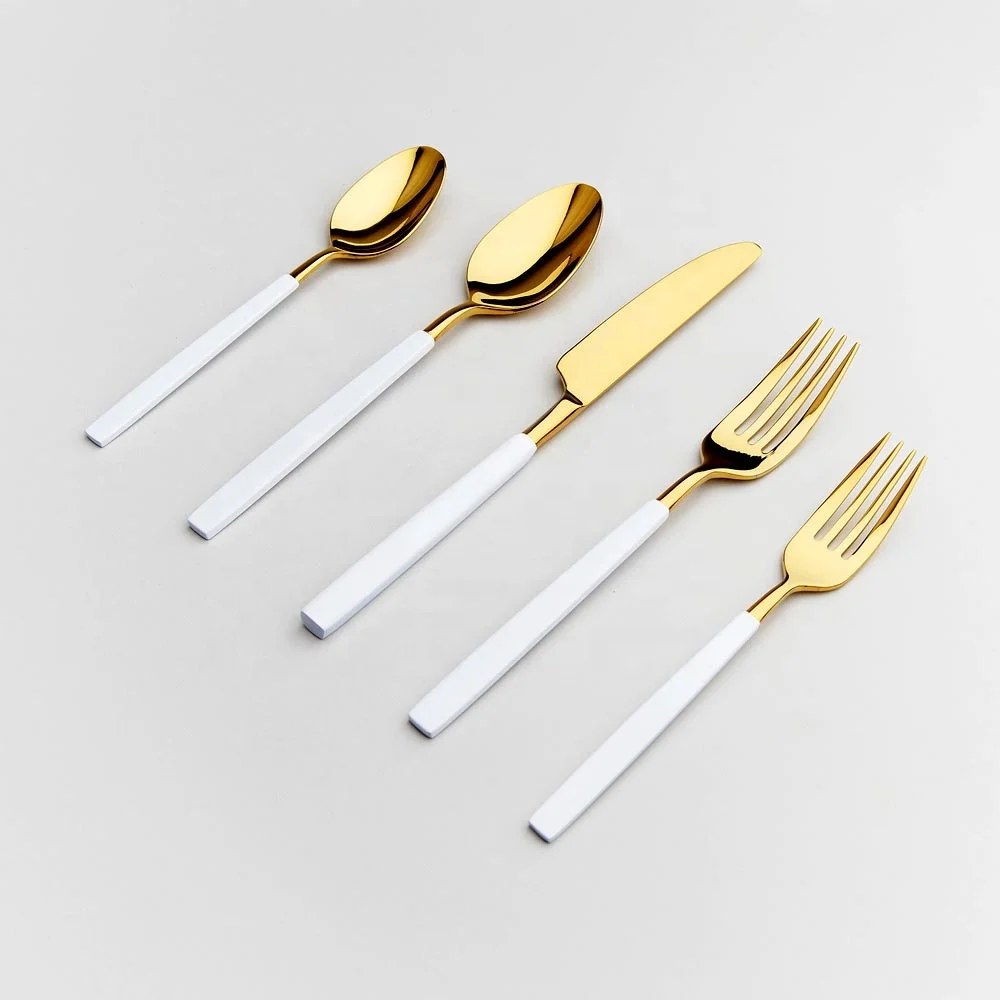 
White Handle Gold Measuring Spoons 