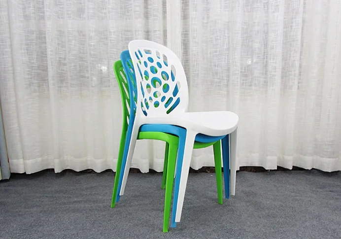 High - quality low - price manufacturers wholesale wedding banquet activities plastic chair can be stacked hole hole chair