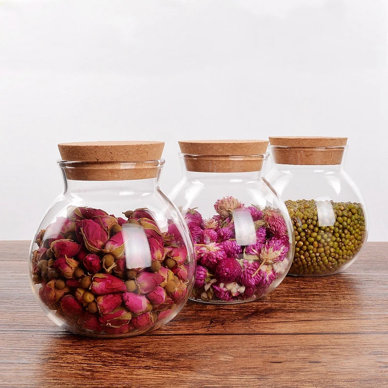 
wholesale glass jars with cork lids Transparent round kitchen storage glass jars for food and scented tea 