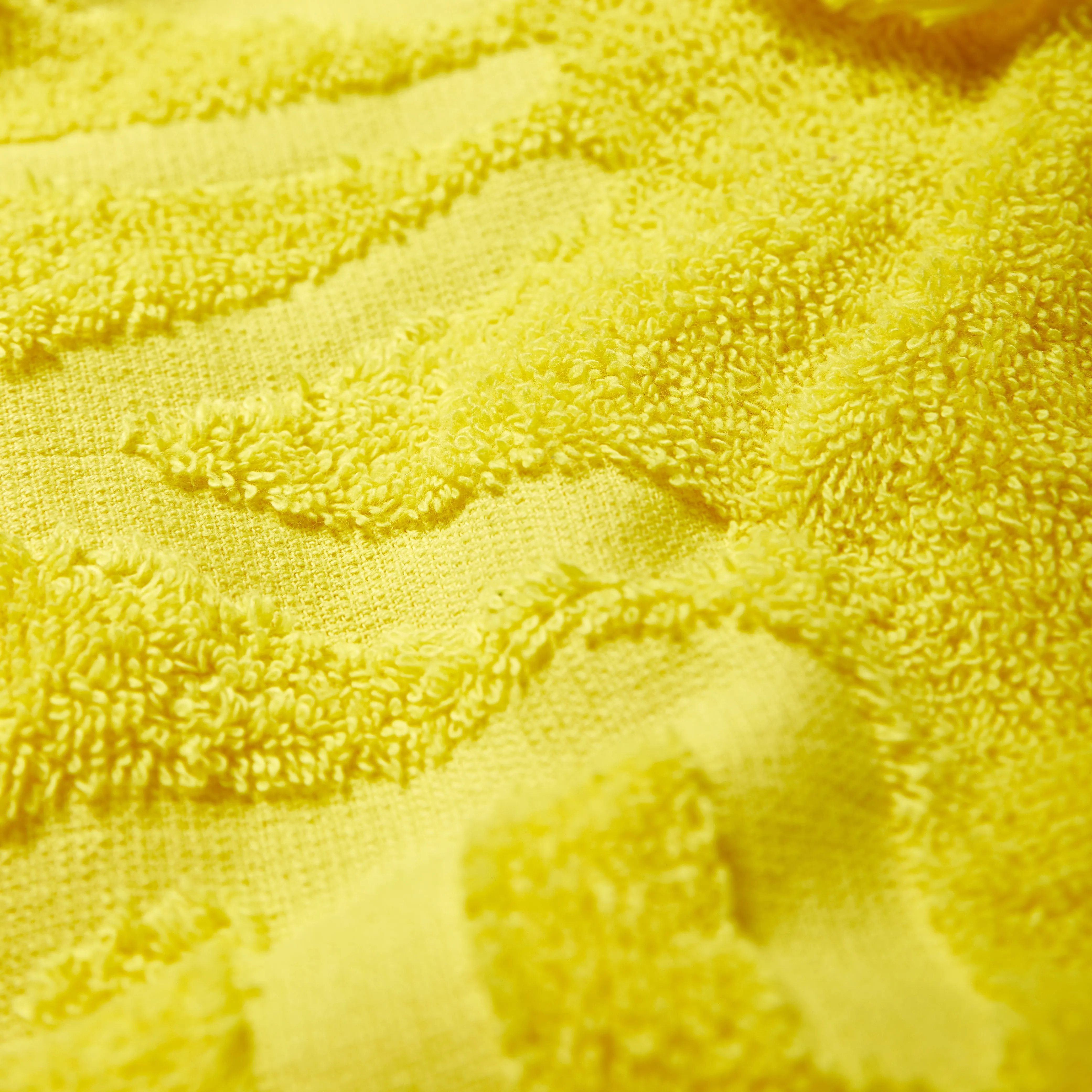 Embossed cotton beach towel with jacquard logo