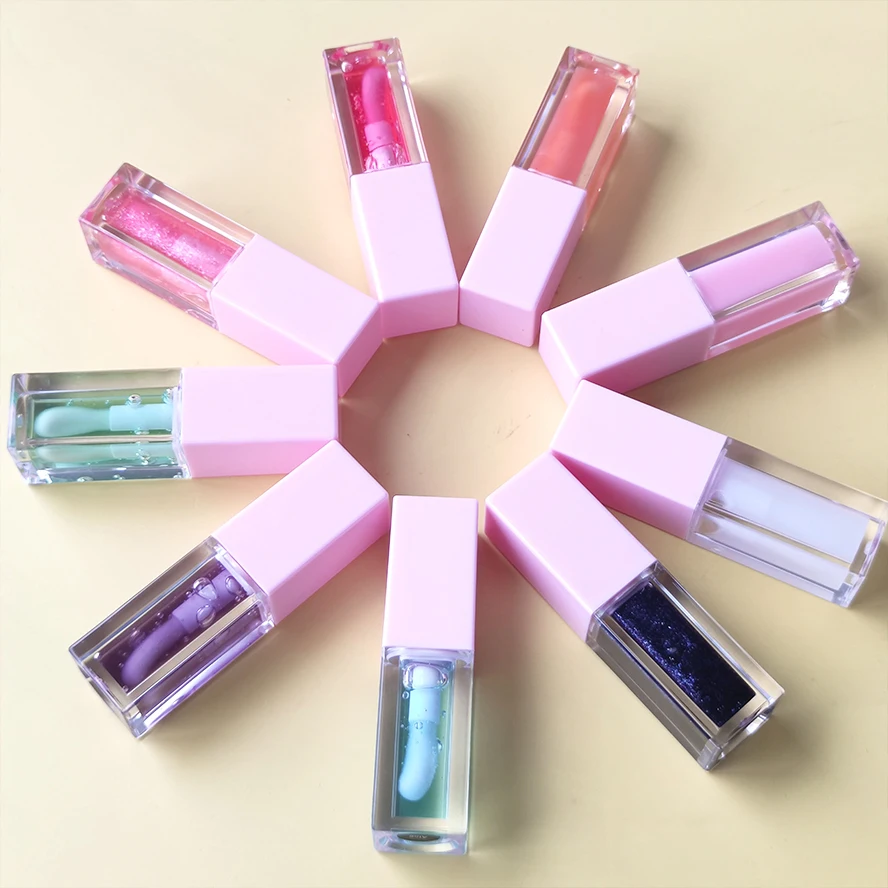 New arrivals vegan clear wholesale creamy custom logo color changing lip gloss oil hyaluronic acid light lip plumper