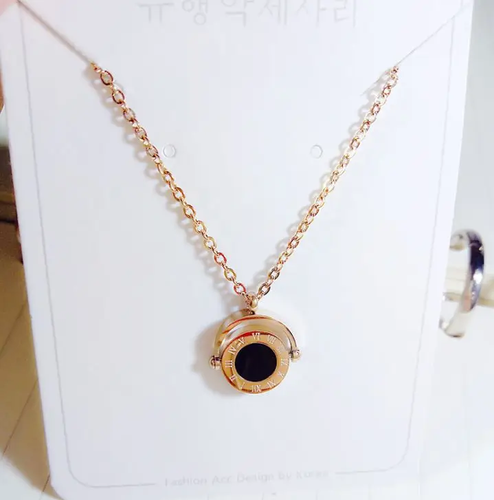 
Titanium steel big circle black and white rotating pendant Korean fashion roman long women sweater thick necklace 