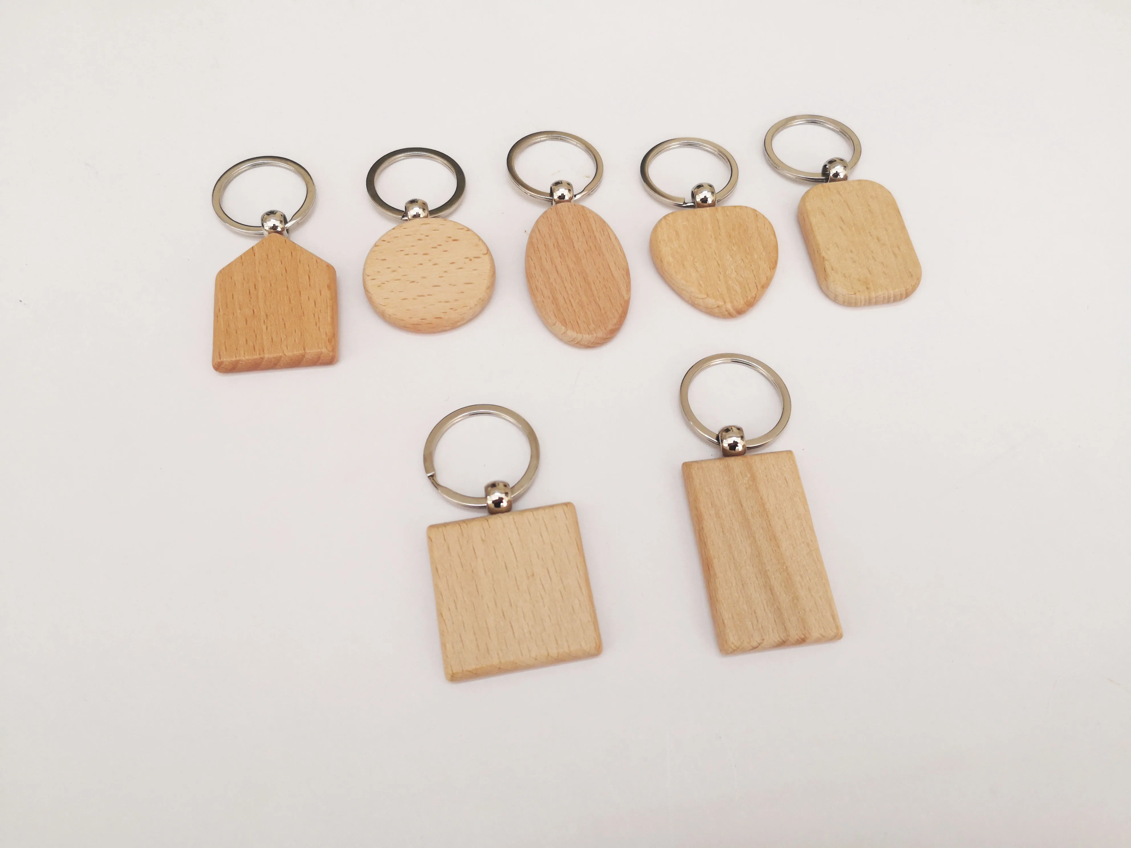 No MOQ DIY blank beech wood key ring, customized laser/printing  LOGO geometric wooden carving keychain