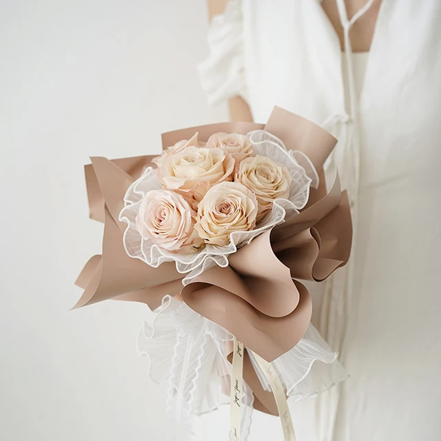 Wholesale floral bouquet wrap china packing solid colors korean style waterproof unique flowers wrapping paper packaging