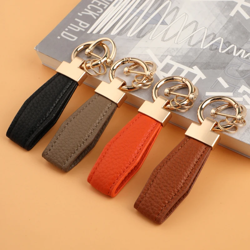 High Quality Factory Custom Wholesale Leather Car Logo Metal Embossed Keychain Zinc Alloy Keychain