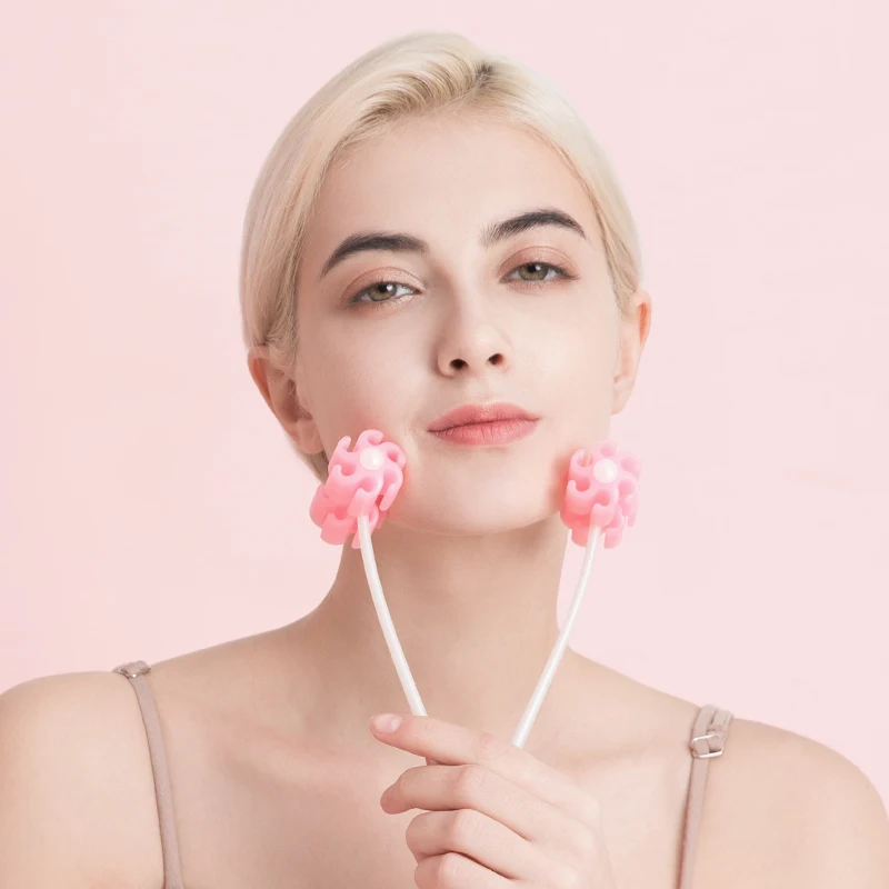Japan&Korea Hot Sell Massager Properties Wrinkle Remove Handheld Plastic Facial Massager Roller