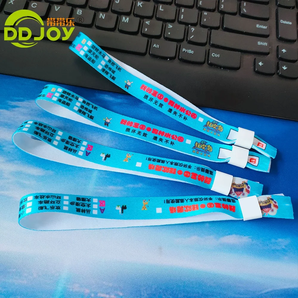 Изготовленные на заказ дешевые передачи тепла CMYK печать на ткани браслеты для одноразового использования горка замок ткань браслет для концерта