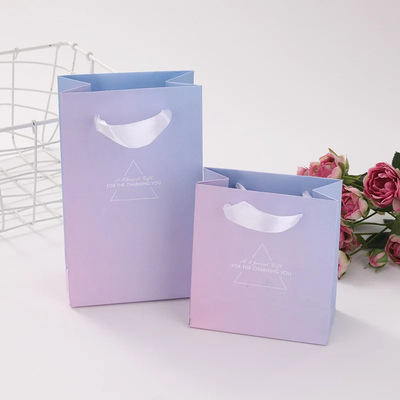 Eco friendly custom logo Gift bags Matte Laminated boutique private label elegant pink paper bag With Gold Ribbon