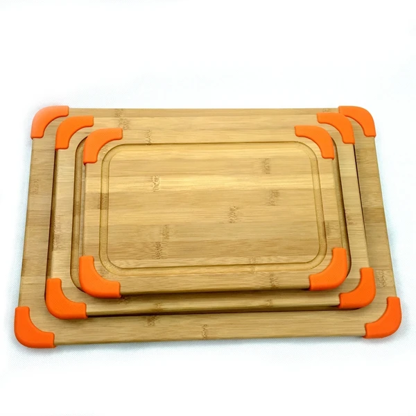 Hot sale natural color organic bamboo cutting board with silicone feet
