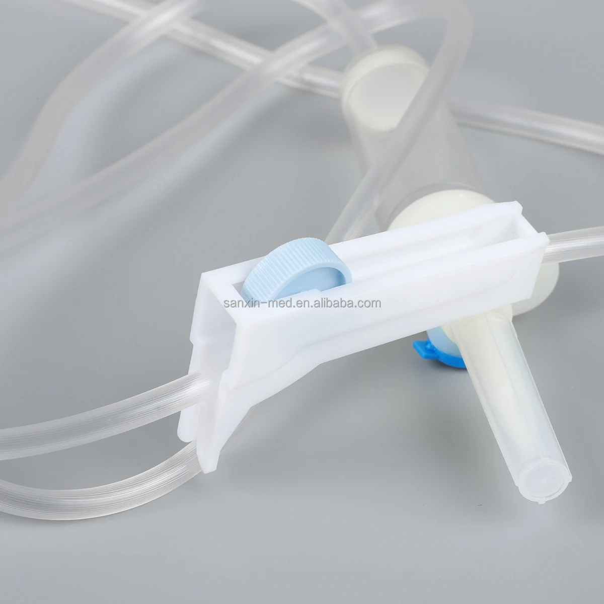 IV fluid flow regulator extension set