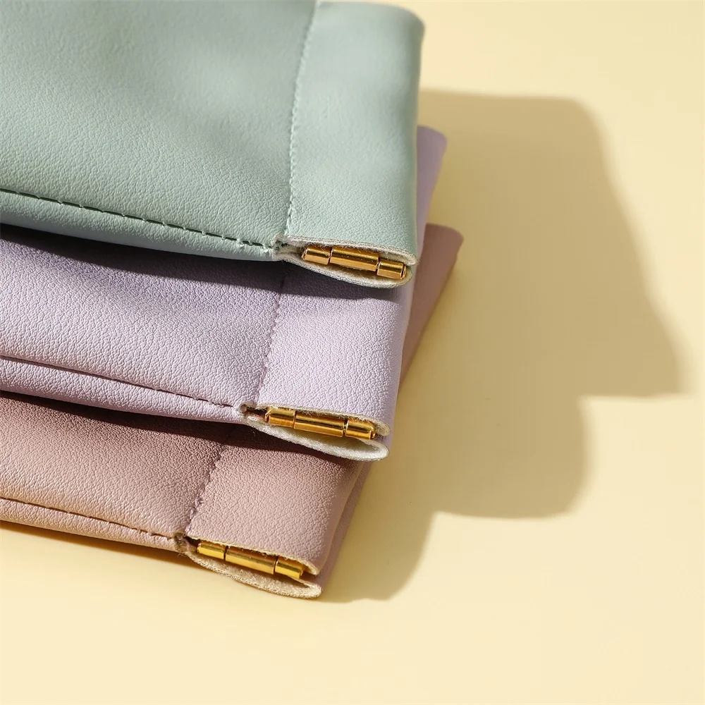 PUPPYSEW Wholesale PU Leather Automatic Closed Shrapnel bag Small Cosmetic Lipstick Pouch  Shrapnel Makeup Jewelry bag WIth logo