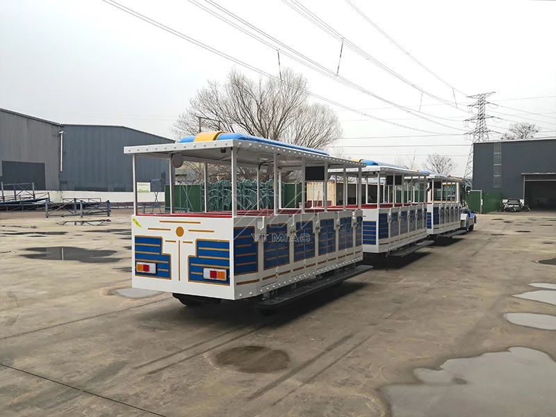 Yimiao 2023 New  Directly factory Big size 60 persons Diesel Train Battery Trackless Train Ride Road Train For Sale