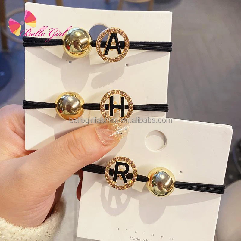 BELLEGIRL Hot selling Korea women gold ball knotted elastic hair ties rhinestone letter words black rubber band for hair