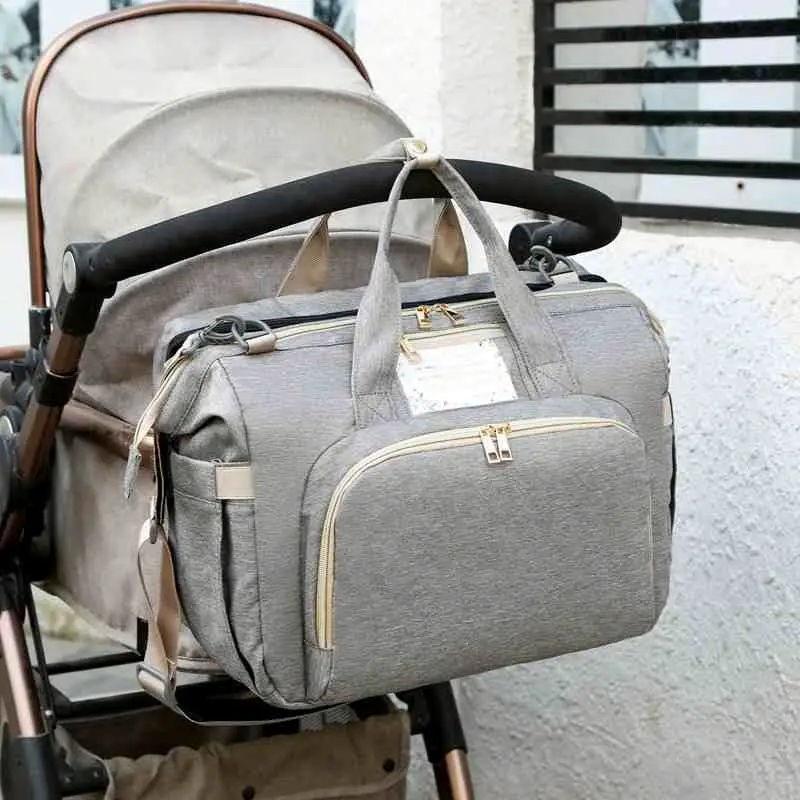 Factory outlet baby diapers waterproof breathable wear resistant multi function mommy diaper bag with change diaper station