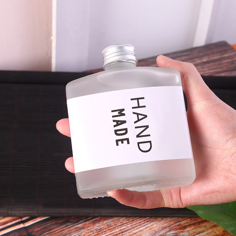 Wholesale 200ml 250ml 8oz glass oblique shoulder flat wine bottle portable empty wine bottle