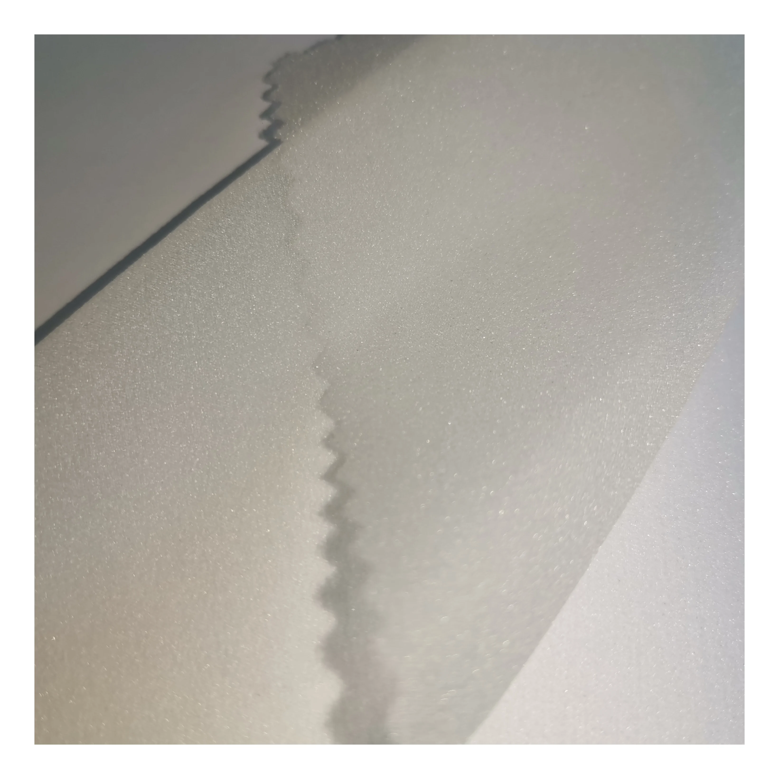 PA Double Dot 100% Polyester Soft Ligjt Thin Elegant Transparent Fusible Woven Interlining For Female Thin Chiffon Fabric