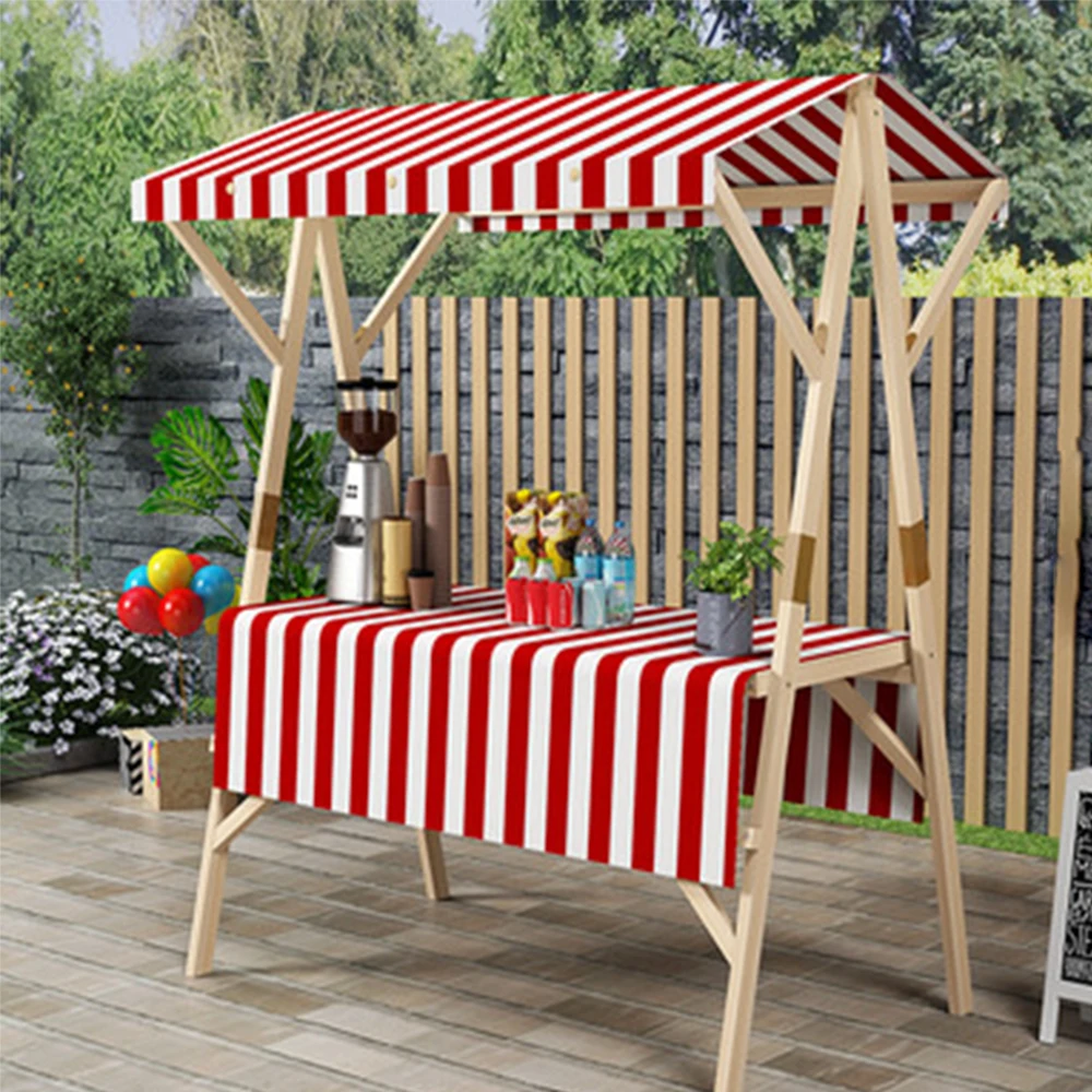 Wooden market stand stall with orange white striped awning retail business concept