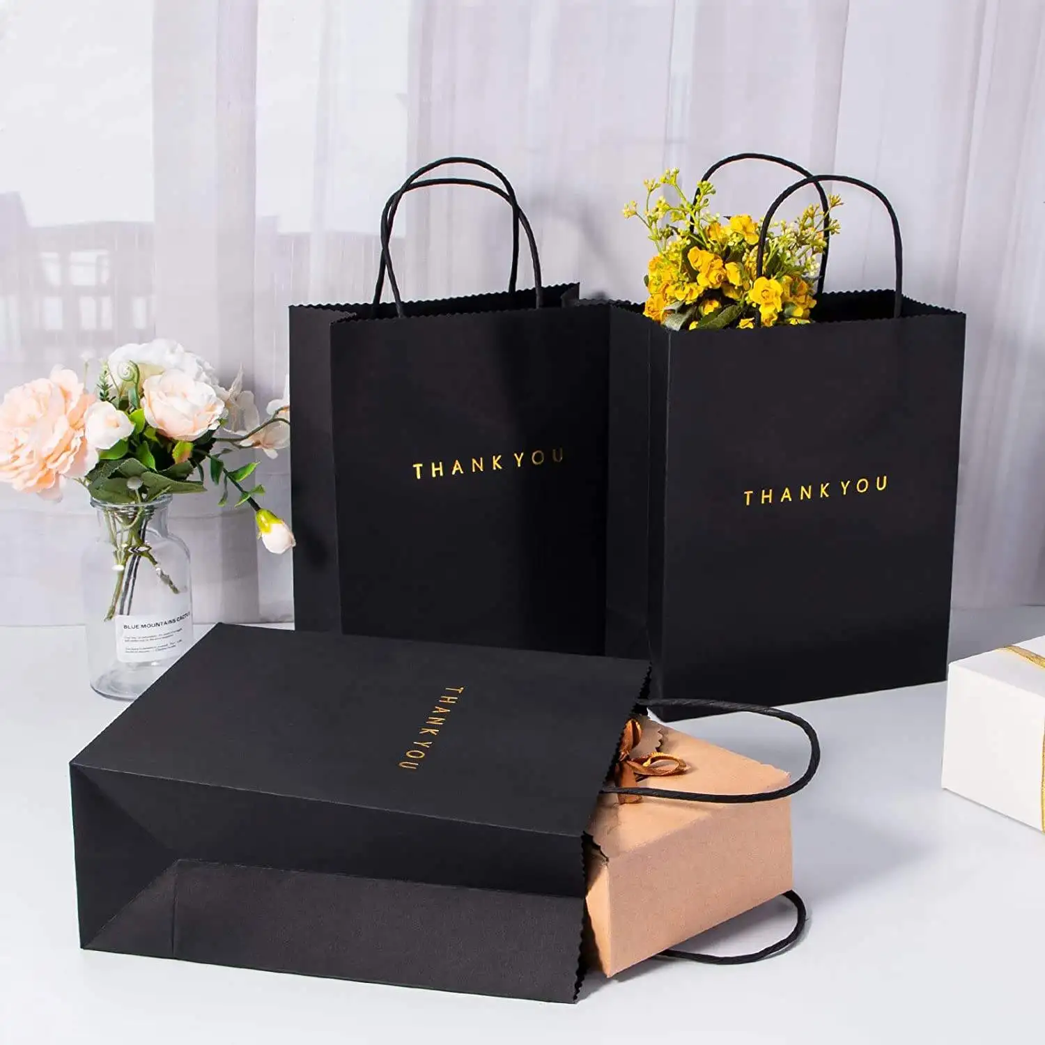 Recyclable cheap low price twisted handle small thank you gift bags black craft paper bag with custom logo