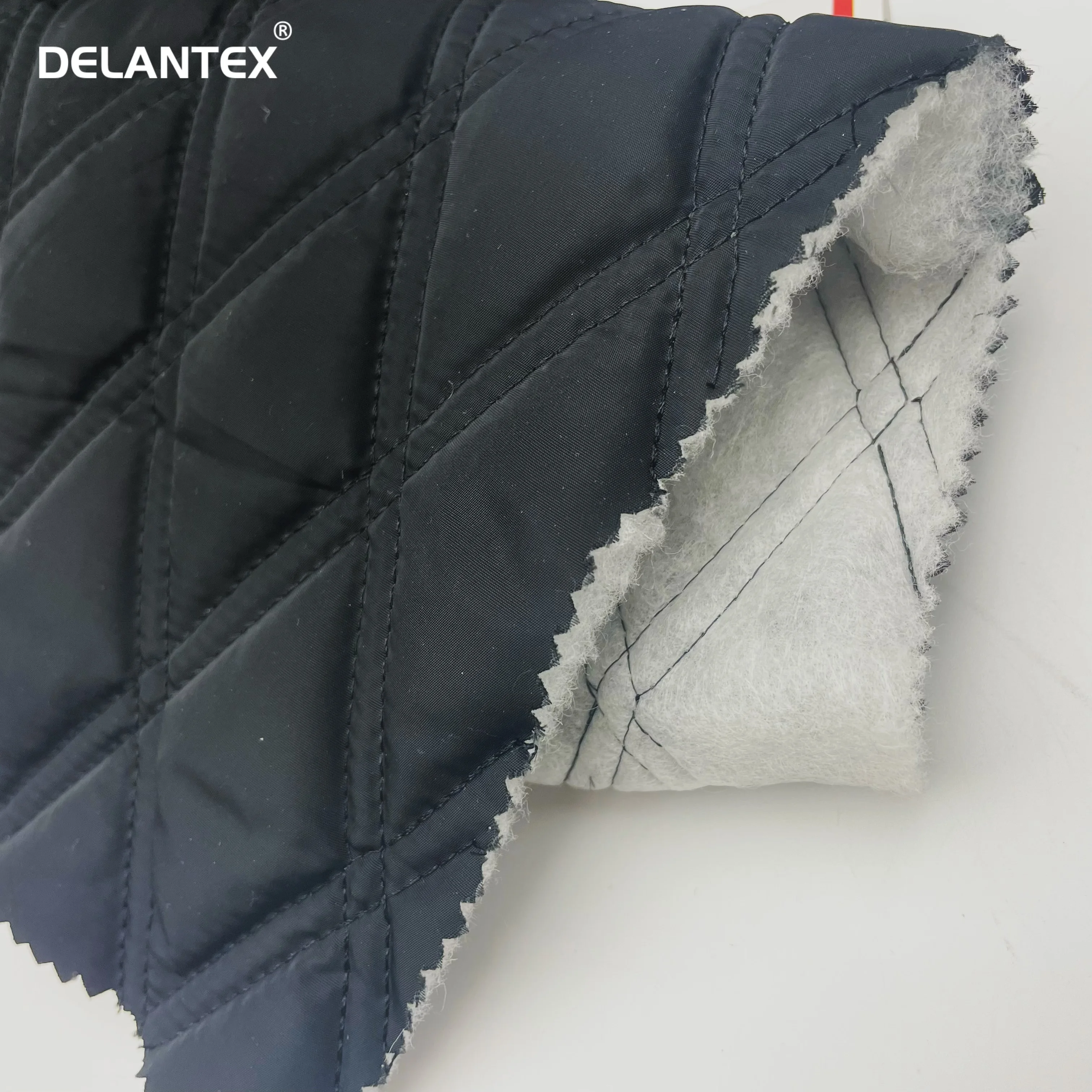 Delantex хорошая цена и хорошие продажи 100 полиэстер 2-слойная стеганая ткань для пуховика
