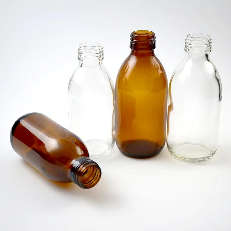 Wholesale 30ml-500ml cosmetic clear amber  round glass bottle for liquid medicine