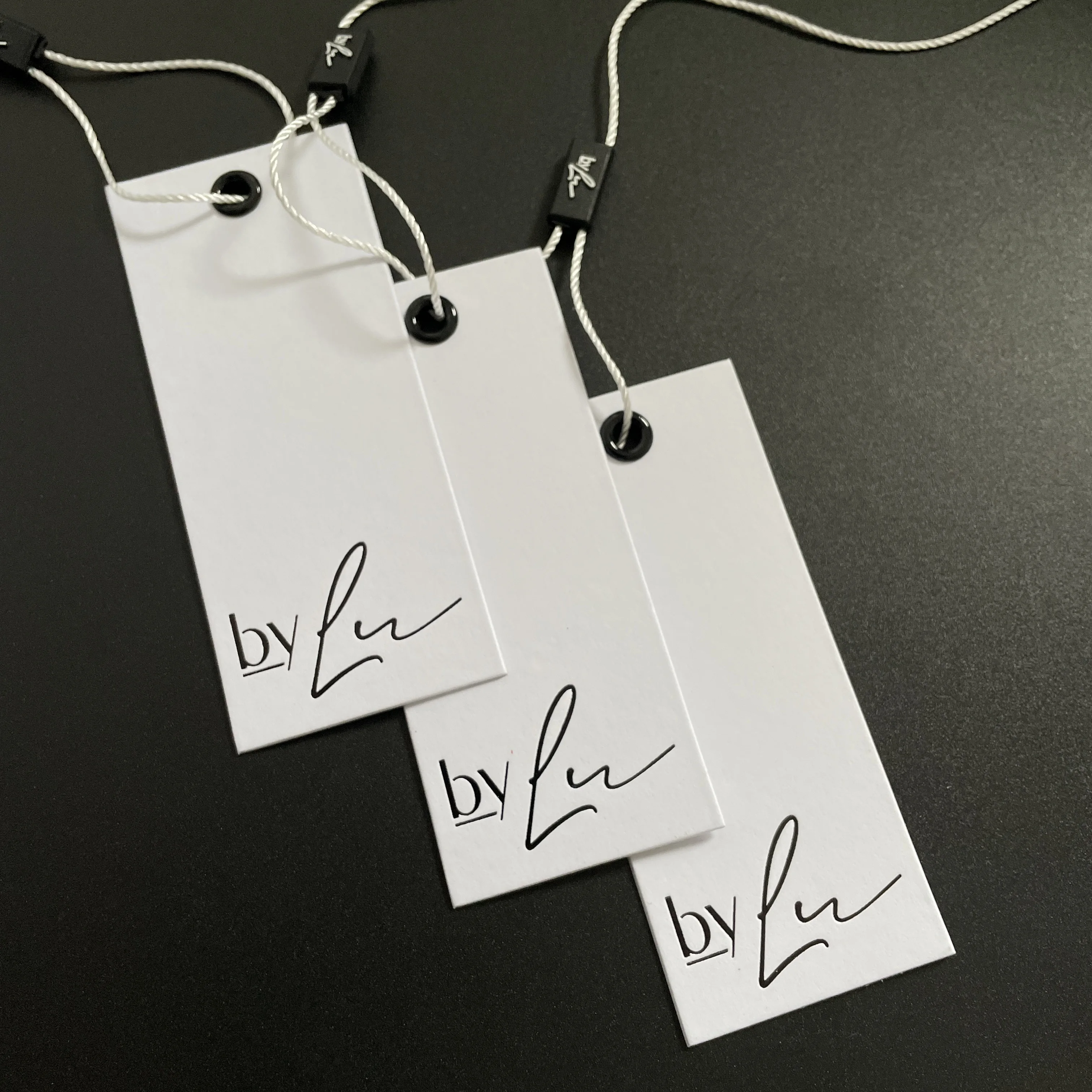 Flying labels Foil Garment Tags custom logo tag  white swing ticket gold foil stamping logo hang tag for jeans and clothing