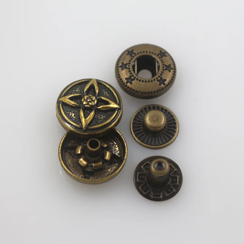 Custom engraved logo flower pattern spring snap fastener metal four part snap button for clothing