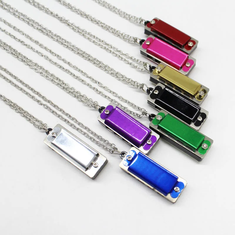 Wholesale custom logo hot selling stainless steel  4 hole 8 tone harmonica with opp  bag packing