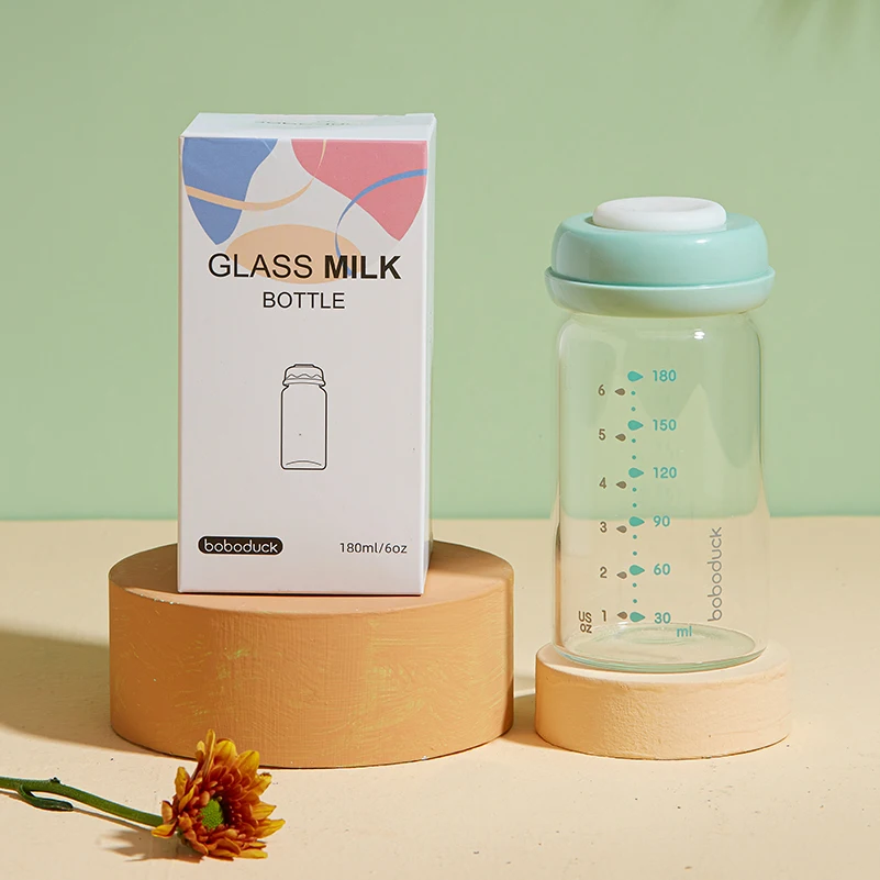 Wholesale high quality transparent water juice coffee baby milk storage bottles milk bottle glass bottle