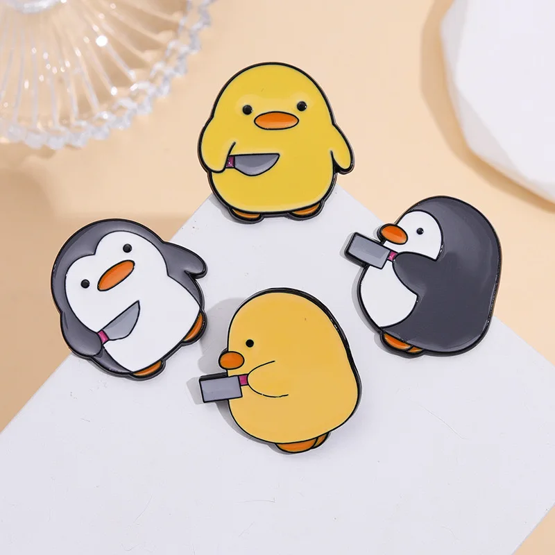 Little penguin dagger knife brooches custom design cartoon funny metal lapel pin cute animal enamel badge