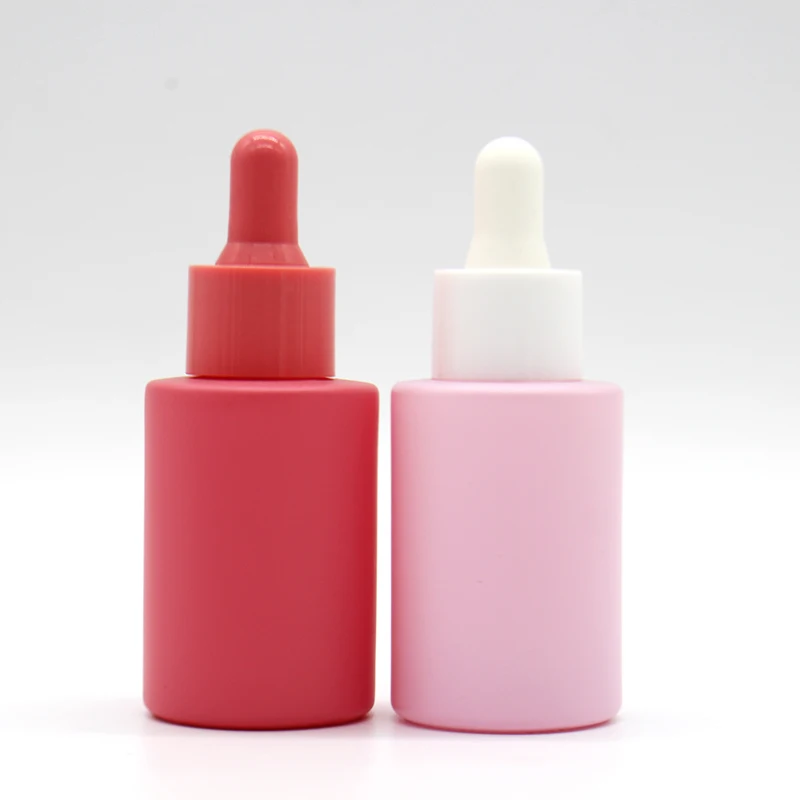 Customize 30ml cosmetic perfume essence 1oz 2oz  frosted glass essential oil pink dropper bottle dropper with box packaging