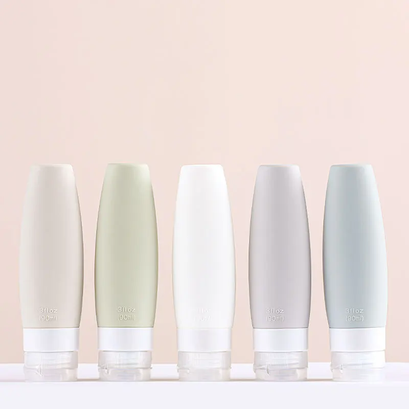 2023 New home travel extruded silica gel bottle 60ml 90ml set portable facial cleanser silicone soft tube