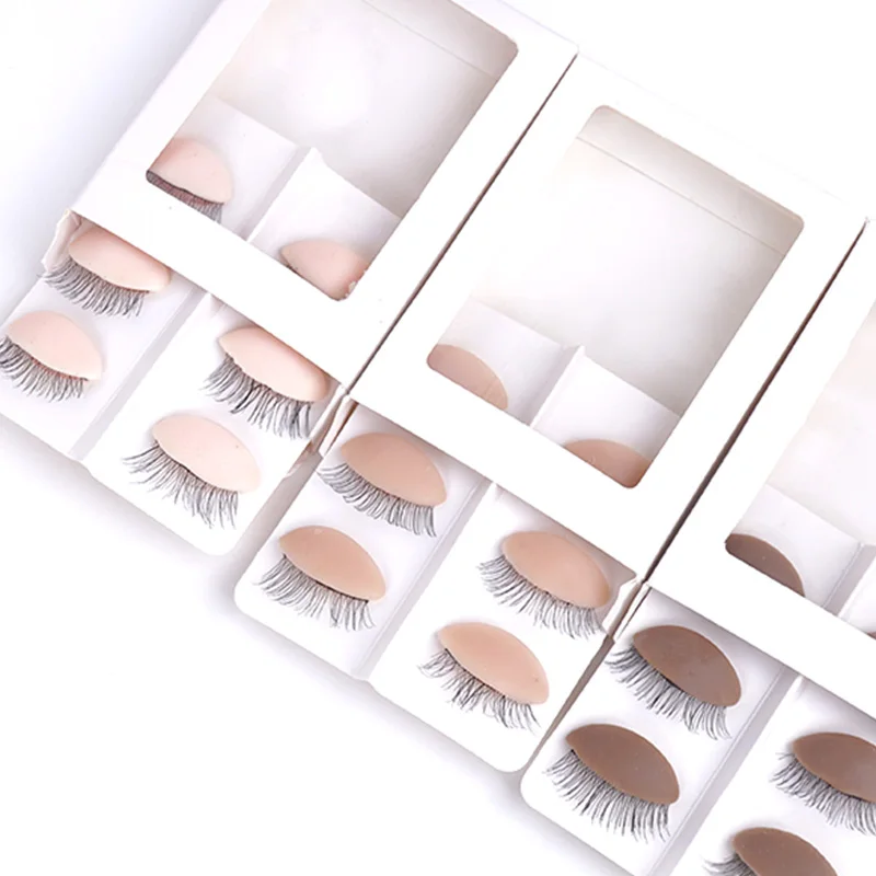 Removable silicone eyes with eyelashes to replace eyelid practice. Silicone mannequin head for grafting eyelashes