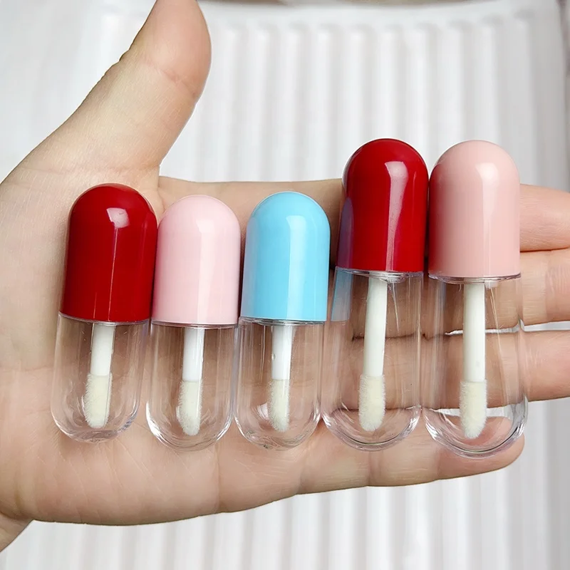 JIE MEI Pack Popular 3ML 4ML Cute Pill Capsule Style Lip Gloss Wand Tube Container Custom Logo Mini Lipgloss Bottle for Tester